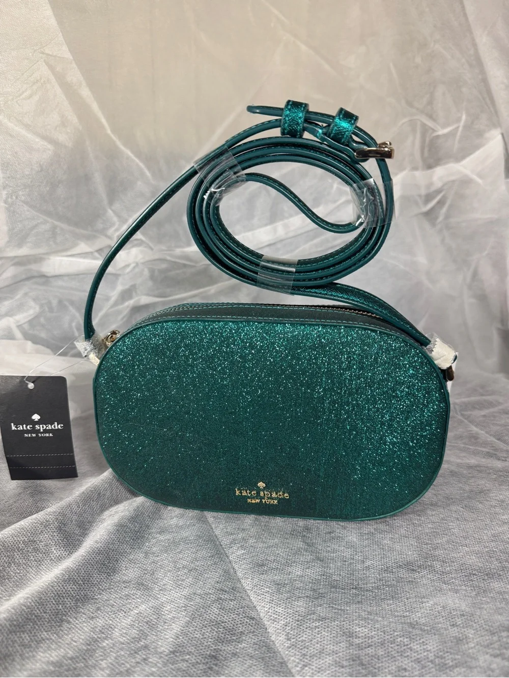 kate spade Teal Glitter Oval Crossbody Bag